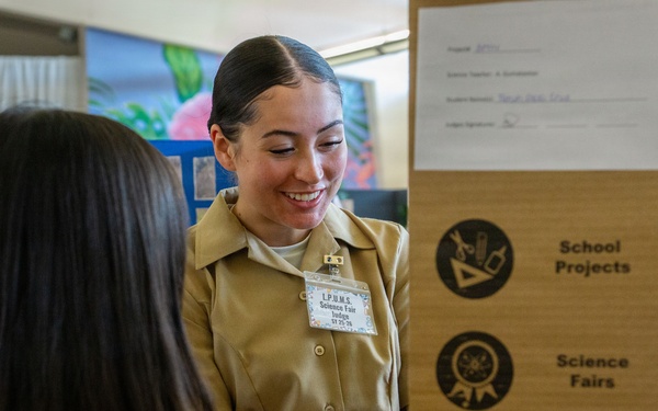 Camp Blaz Marines Judge Untalan Middle School's Science Fair