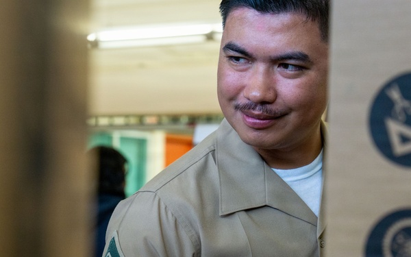 Camp Blaz Marines Judge Untalan Middle School's Science Fair