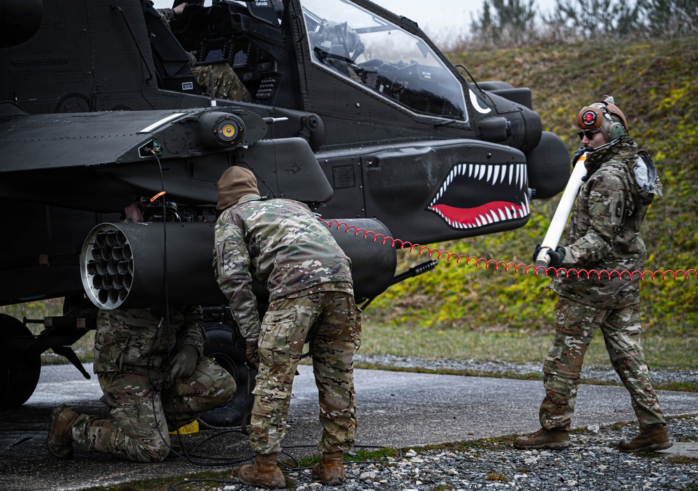 12th CAB Soldiers refuel and rearm Apaches during Operation Skyfall