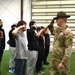 Drill Sgt. John Rollison demonstrates proper salute