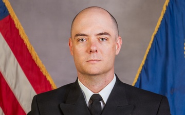 Commander Adam M. Boyd