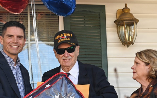 Centennial birthday parade honors WWII veteran