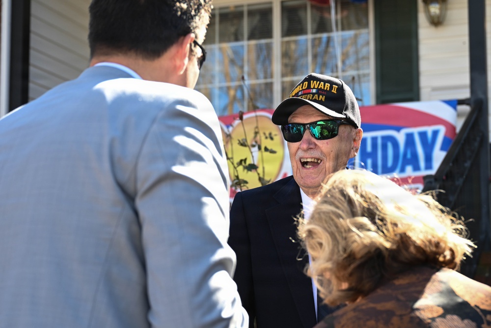 Centennial birthday parade honors WWII veteran