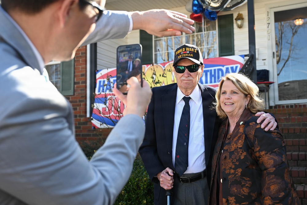Centennial birthday parade honors WWII veteran