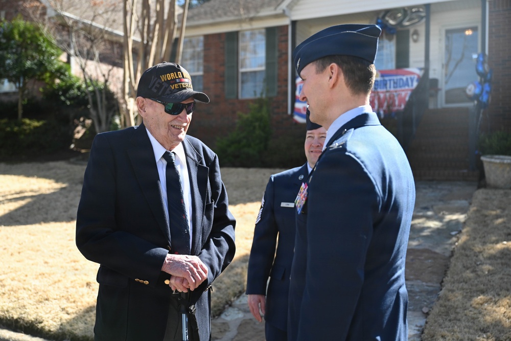 Centennial birthday parade honors WWII veteran