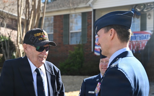 Centennial birthday parade honors WWII veteran