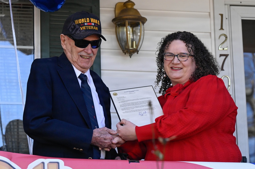 Centennial birthday parade honors WWII veteran