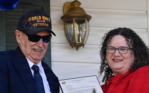 Centennial birthday parade honors WWII veteran