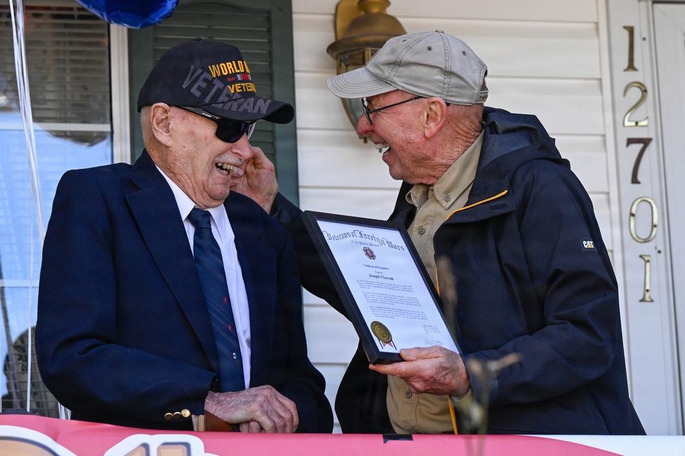 Centennial birthday parade honors WWII veteran