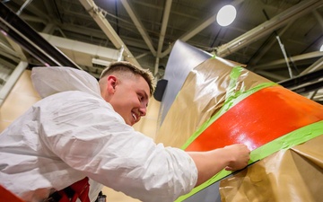 Wyoming Airmen Paint the Tail That Tells the Story