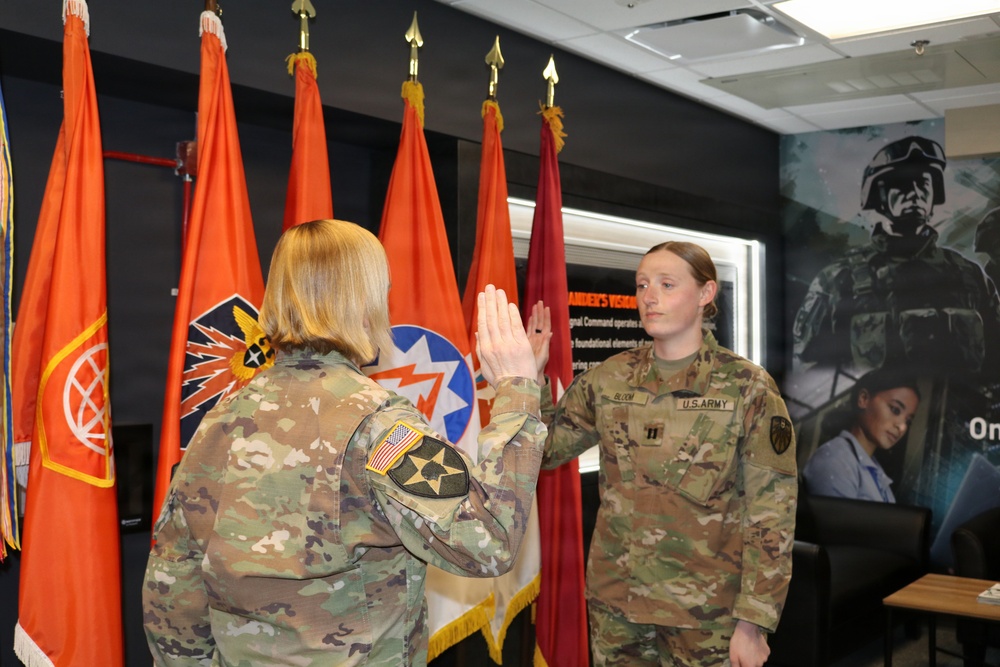 Brig. Gen. Wiersgalla administers oath of office to Cpt. Abigail Bloom