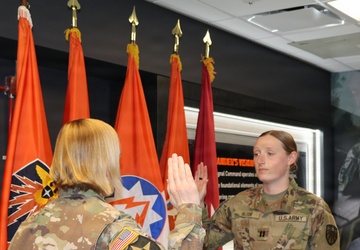 Brig. Gen. Wiersgalla administers oath of office to Cpt. Abigail Bloom