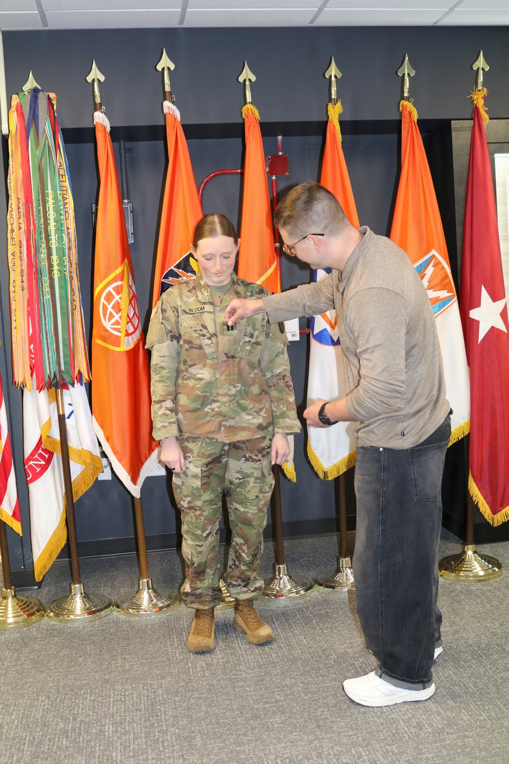 First Lieutenant Abigail Bloom's husband pins new Captain rank