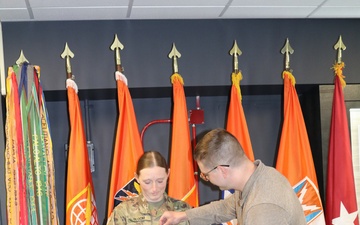First Lieutenant Abigail Bloom's husband pins new Captain rank