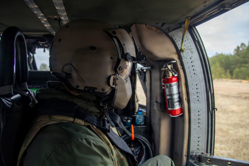 3rd CAB trains Latvian Air Force on UH-60 Gunnery Table VI day/night individual qualification