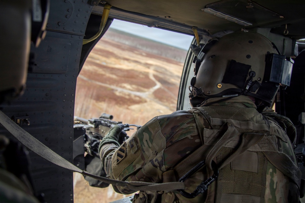 3rd CAB trains Latvian Air Force on UH-60 Gunnery Table VI day/night individual qualification