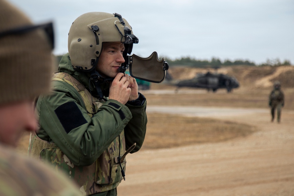 3rd CAB trains Latvian Air Force on UH-60 Gunnery Table VI day/night individual qualification