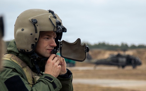 3rd CAB trains Latvian Air Force on UH-60 Gunnery Table VI day/night individual qualification