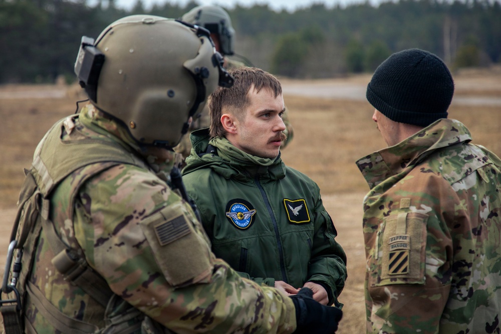 3rd CAB trains Latvian Air Force on UH-60 Gunnery Table VI day/night individual qualification