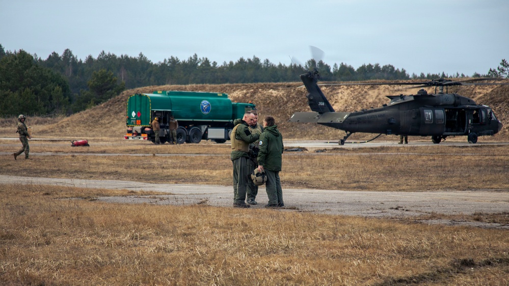 3rd CAB trains Latvian Air Force on UH-60 Gunnery Table VI day/night individual qualification
