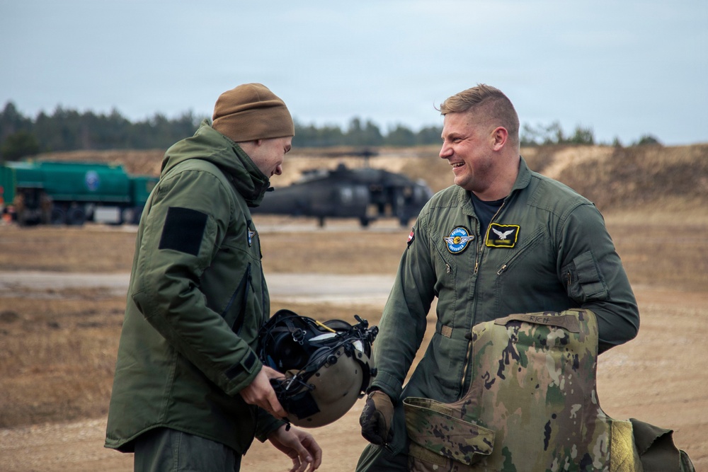 3rd CAB trains Latvian Air Force on UH-60 Gunnery Table VI day/night individual qualification