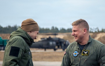 3rd CAB trains Latvian Air Force on UH-60 Gunnery Table VI day/night individual qualification