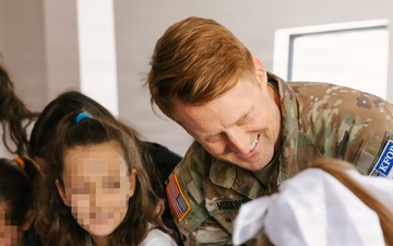 FLARNG Soldiers celebrate Teacher’s Day with local students as part of KFOR 36