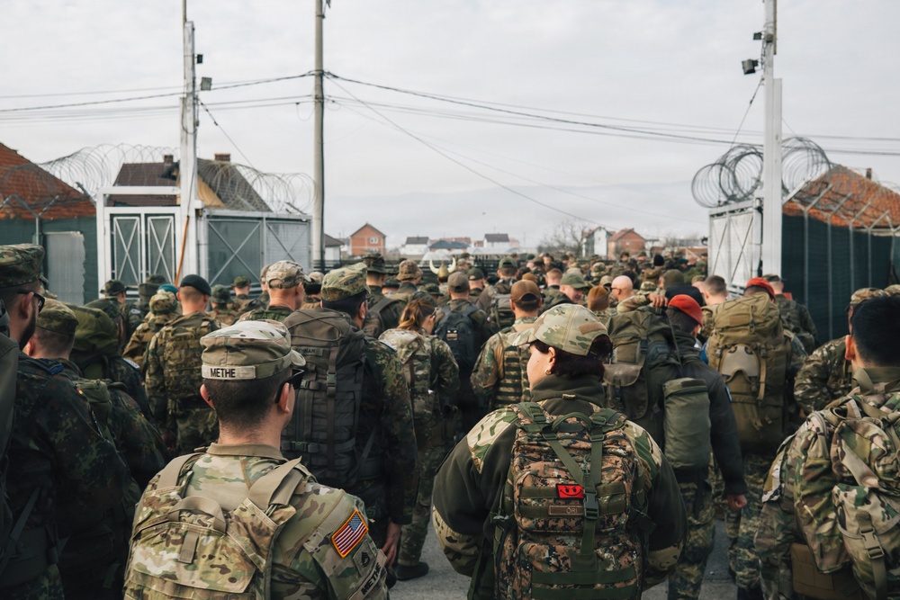 KFOR Multinational Soldiers Test Endurance During Danish Contingent March