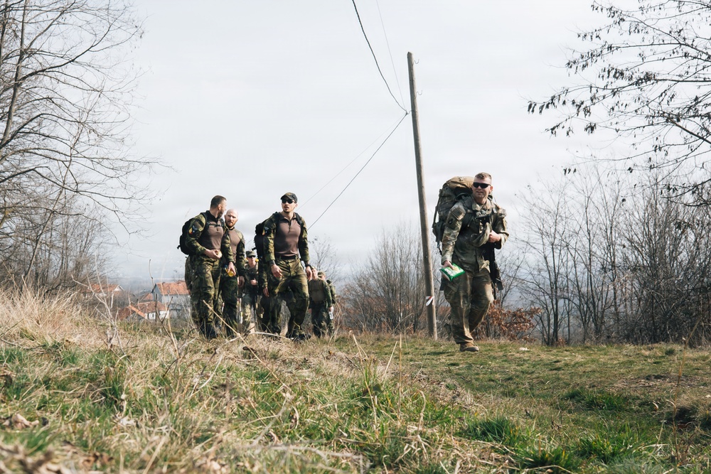 KFOR Multinational Soldiers Test Endurance During Danish Contingent March