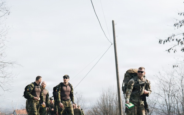 KFOR Multinational Soldiers Test Endurance During Danish Contingent March