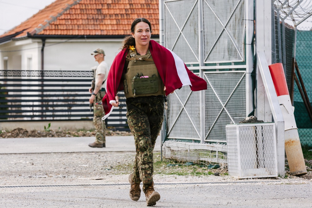 KFOR Multinational Soldiers Test Endurance During Danish Contingent March