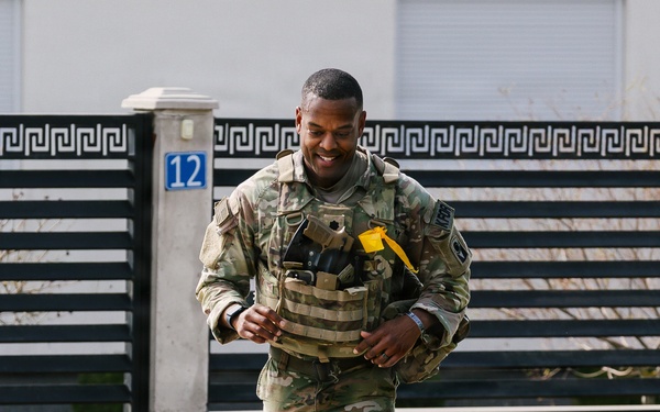 KFOR Multinational Soldiers Test Endurance During Danish Contingent March