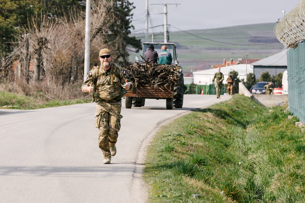 KFOR Multinational Soldiers Test Endurance During Danish Contingent March