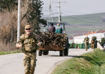 KFOR Multinational Soldiers Test Endurance During Danish Contingent March