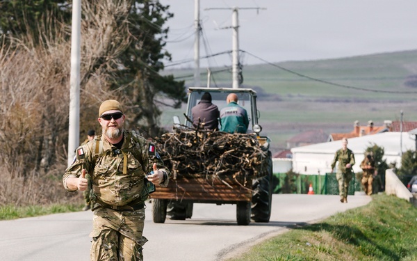 KFOR Multinational Soldiers Test Endurance During Danish Contingent March