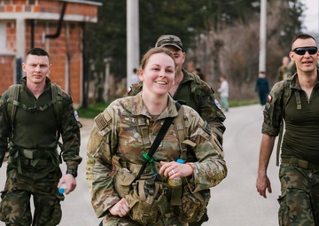 KFOR Multinational Soldiers Test Endurance During Danish Contingent March