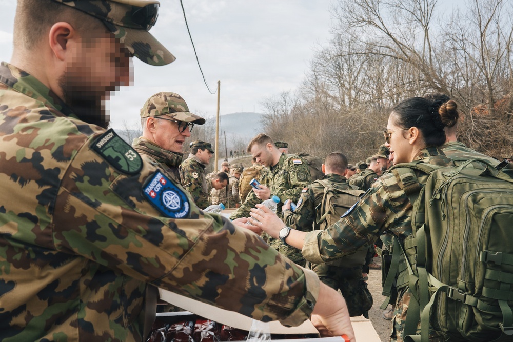 KFOR Multinational Soldiers Test Endurance During Danish Contingent March