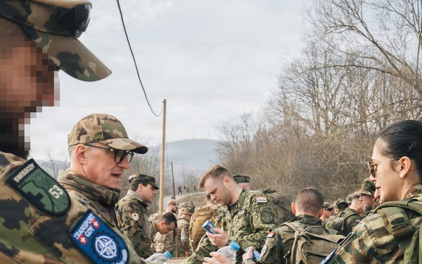 KFOR Multinational Soldiers Test Endurance During Danish Contingent March