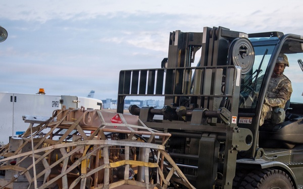 374 AW loads cargo during BM26