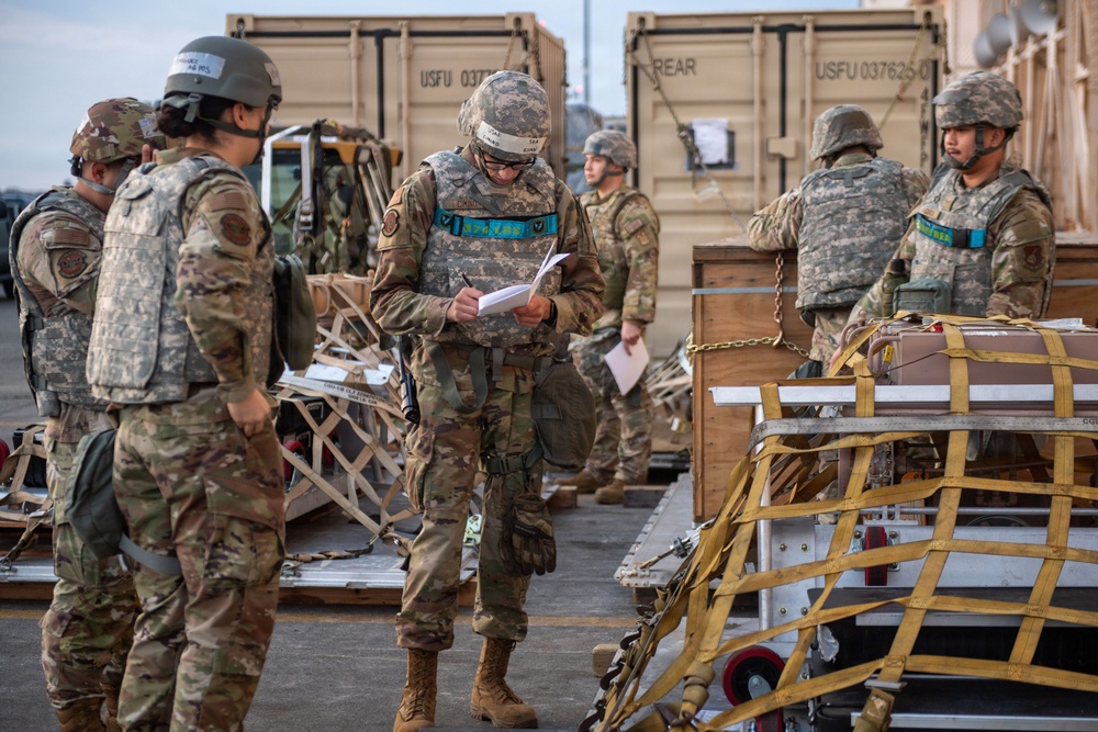 374 AW loads cargo during BM26