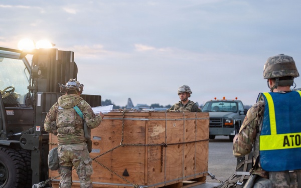 374 AW loads cargo during BM26