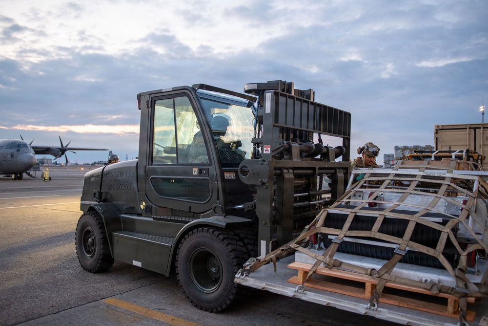 374 AW loads cargo during BM26