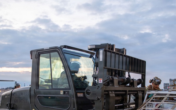 374 AW loads cargo during BM26