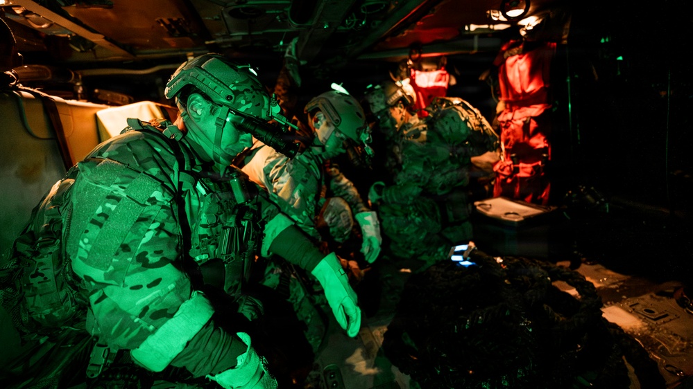 EOD Technicians Practice Nighttime Rappelling and Fast-Roping Techniques