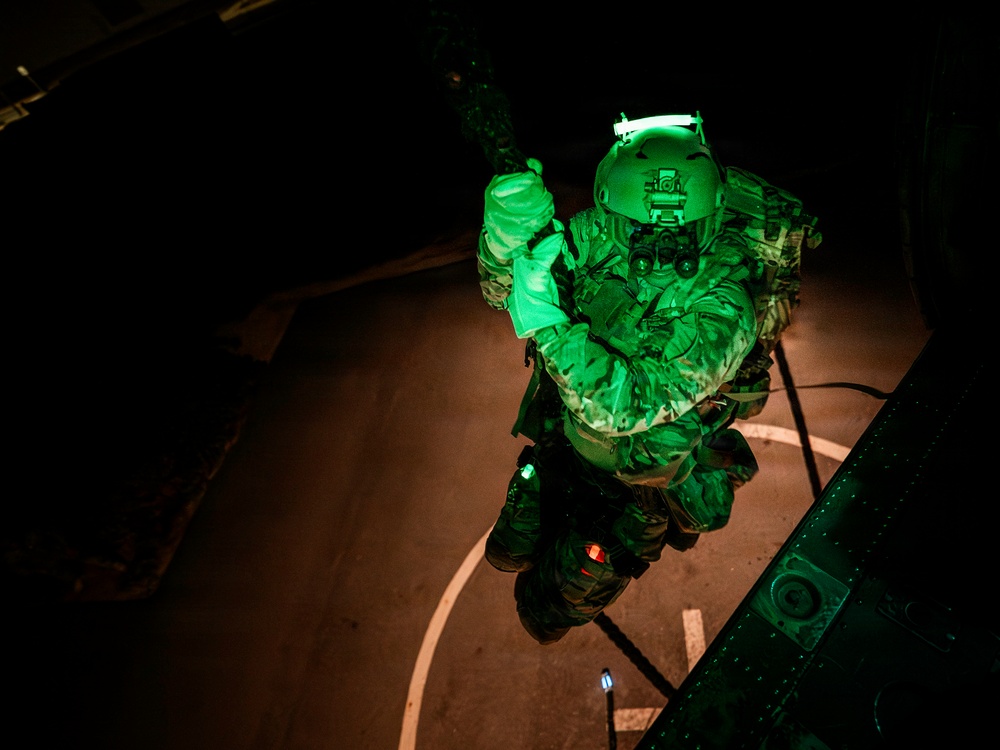EOD Technicians Practice Nighttime Rappelling and Fast-Roping Techniques