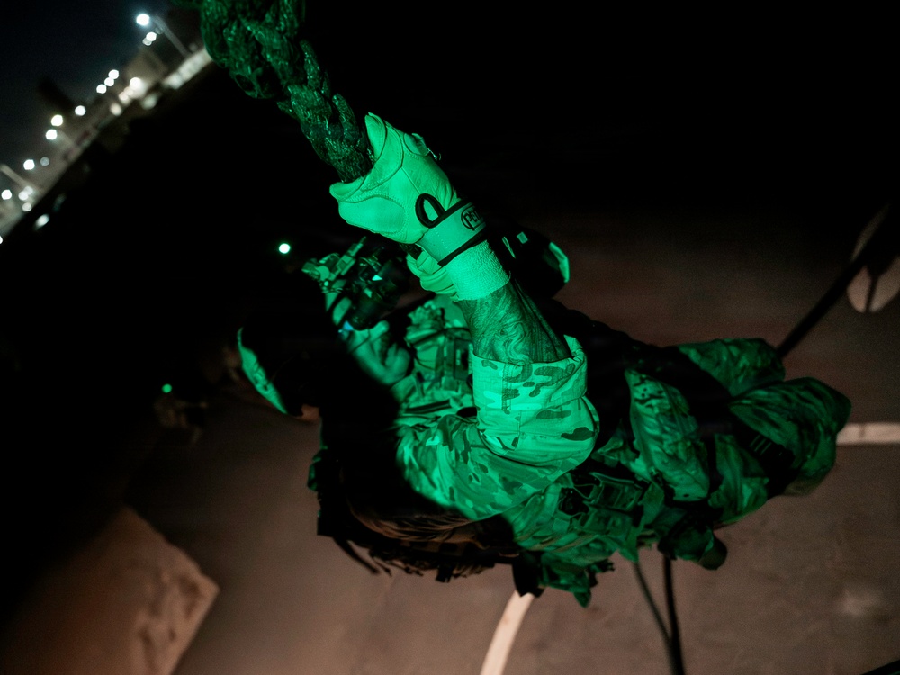 EOD Technicians Practice Nighttime Rappelling and Fast-Roping Techniques