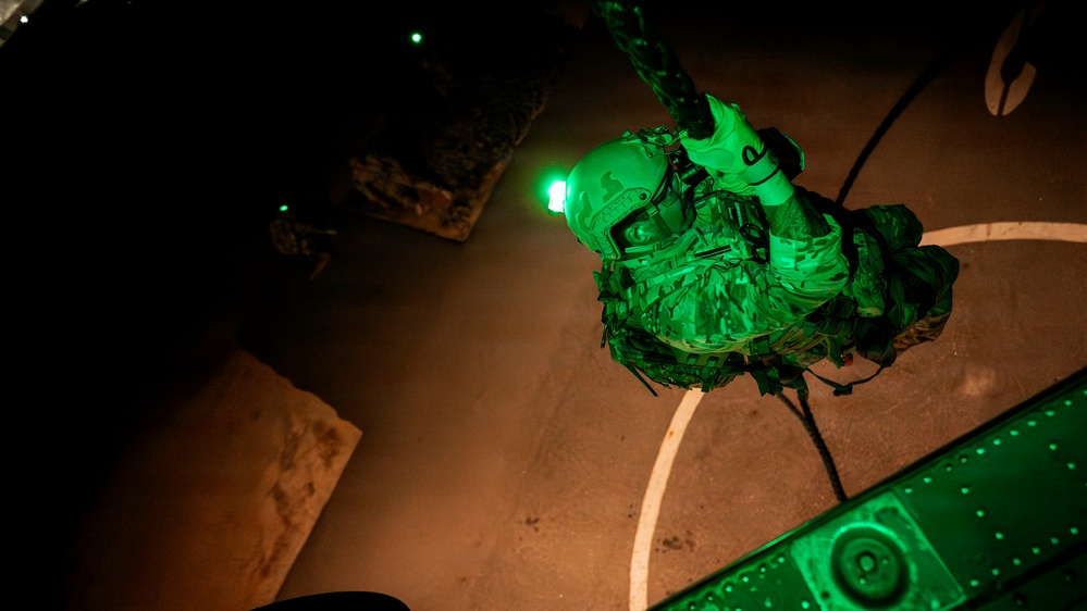 EOD Technicians Practice Nighttime Rappelling and Fast-Roping Techniques