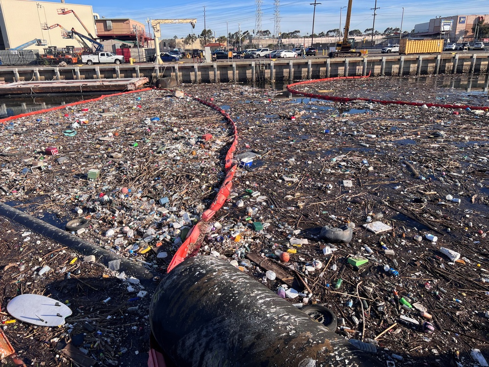 Holding the Line: Navy Crews Intercept Massive Debris Before It Enters Waterways