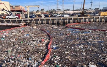 Holding the Line: Navy Crews Intercept Massive Debris Before It Enters Waterways