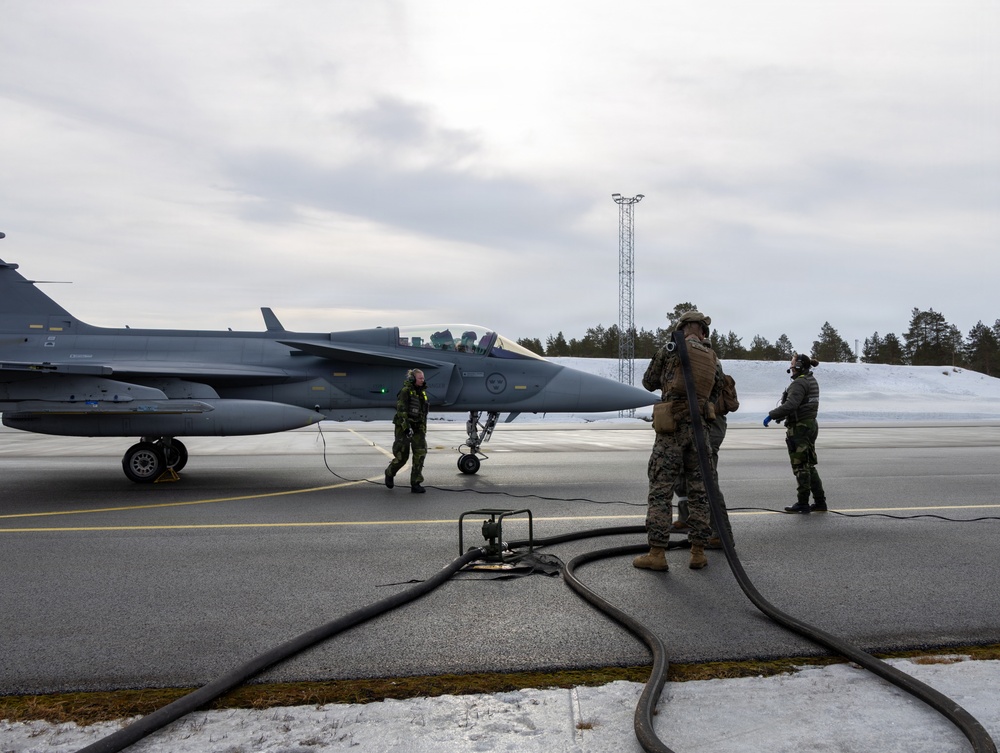 CORE26 | Swedish Soldiers, U.S. Marines Join Together to Fuel Aircraft in the Arctic